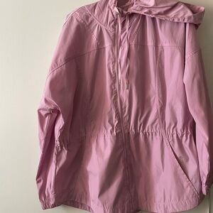 Light pink windbreaker jacket with front zipper and hood
